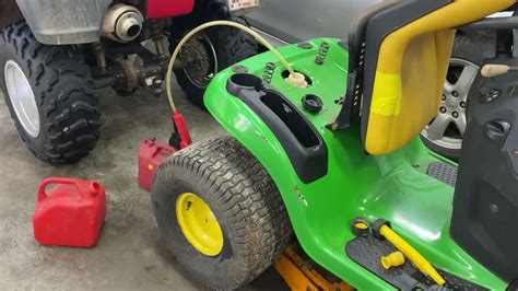 then clearup and run not to bad replaced a bunch of stuff still the same. . How to drain gas from john deere x300